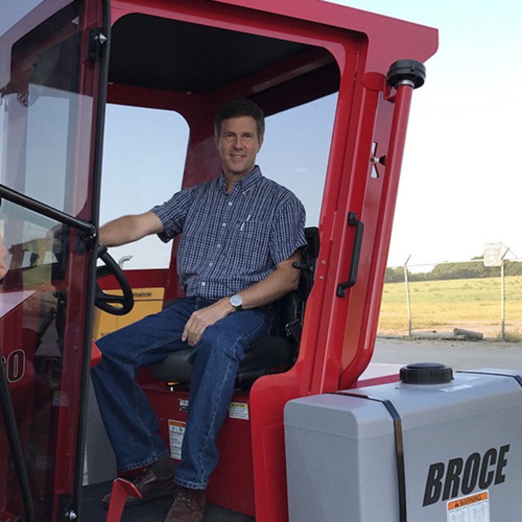 CEO Alan Vance sits in a cabbed BW-260 sweeper
